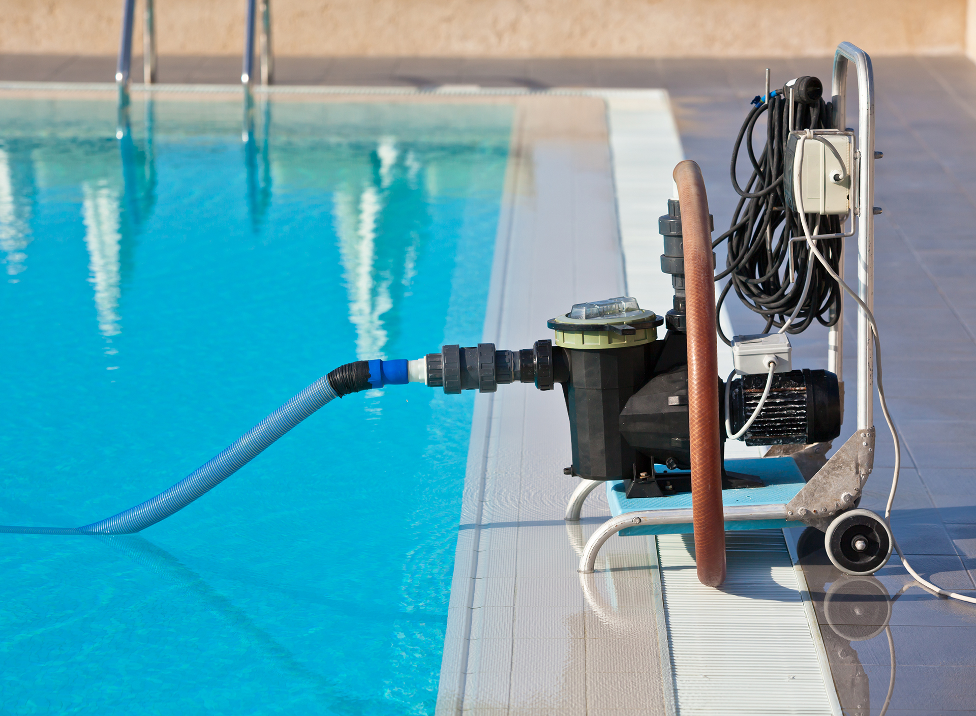 Cleaning pump working with a swimming pool. Horizontal shot