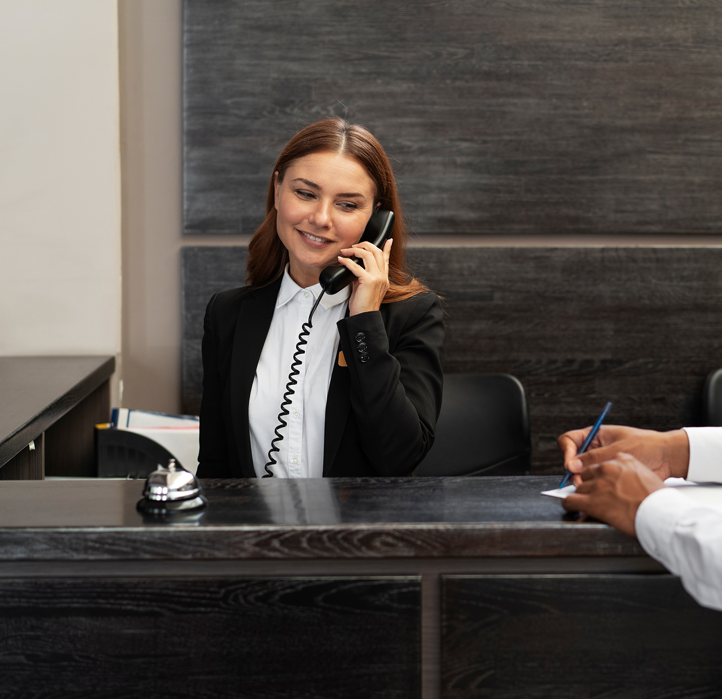 receptionist-elegant-suit-during-work-hours-with-customer